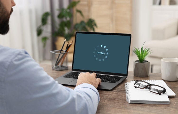 fix pdf attachment person working on PDF repair software on laptop desktop