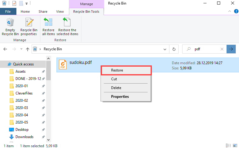 restore pdf file computer recycling bin icon with PDF file highlighted